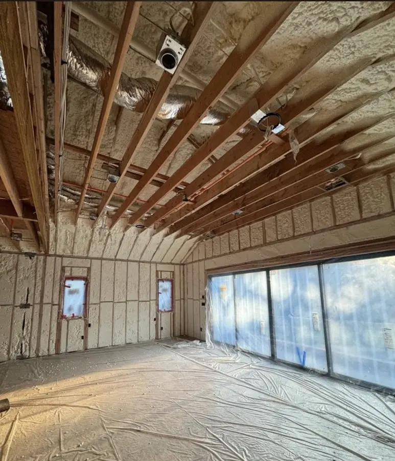 Interior walls and ceiling insulated with spray foam during new construction in Wendell